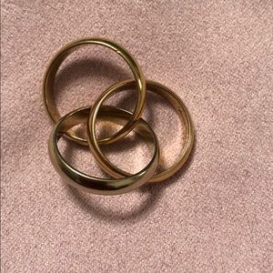 Lady’s 18 K tri- tone yellow gold rings.